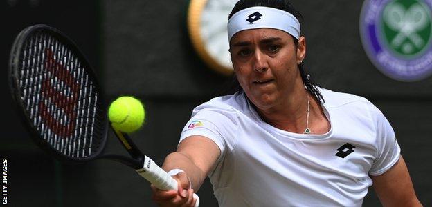 Ons Jabeur in action against Tatjana Maria in her Wimbledon semi-final