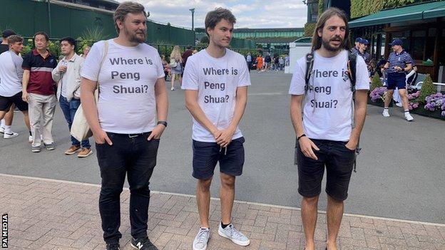 Campaigners wearing T-shirts with the question "Where is Peng Shuai?"