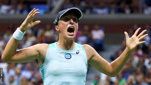 Iga Swiatek celebrates after winning her US Open quarter-final against Jessica Pegula