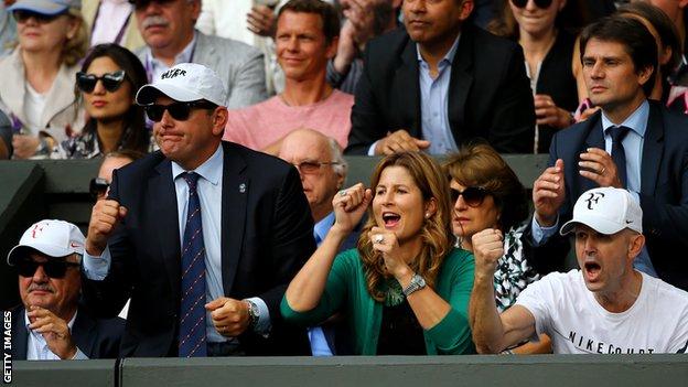 Mirka Federer cheering on husband Roger during a match at Wimbledon