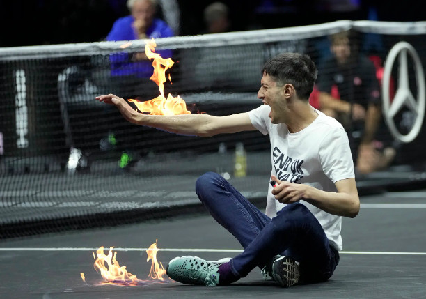 Watch: Protester Lights Arm on Fire at Laver Cup