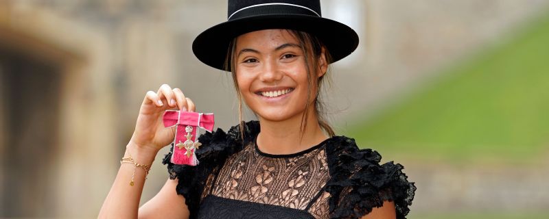 Emma Raducanu receives MBE from King Charles for services to tennis