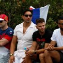 4 with banned Russian flags kicked out of Australian Open by police