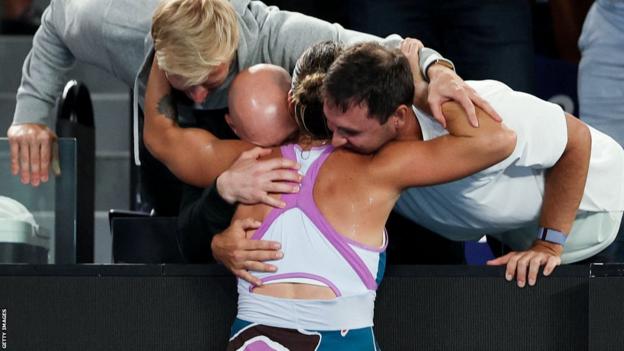 Aryna Sabalenka celebrates with her team after winning the Australian Open title