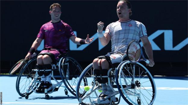 Gordon Reid and Alfie Hewett celebrate winning a point in the men's wheelchair doubles final