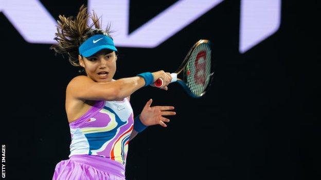 Emma Raducanu hits a return against Coco Gauff at the Australian Open