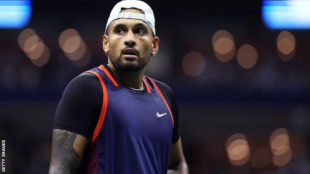Nick Kyrgios looks into the air on court