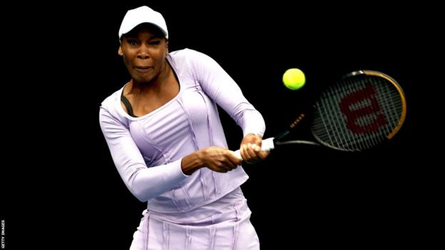 Venus Williams hits a backhand