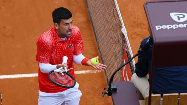 Novak Djokovic argues with umpire Mohamed Lahyani during his Italian Open quarter-final against Holger Rune