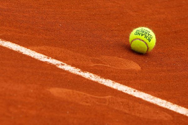 Doubles team disqualified as errant hit strikes ball girl