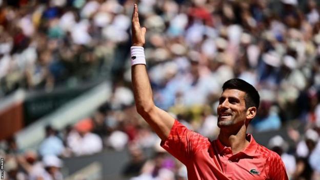 Novak Djokovic reacts to the French Open crowd