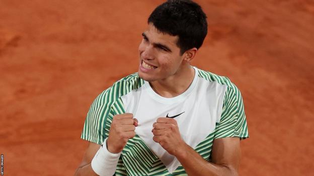 Carlos Alcaraz celebrates reaching the semi-finals