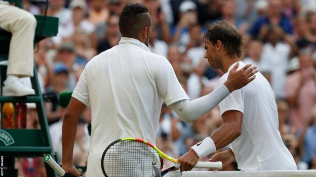 Rafael Nadal and Nick Kyrgios shake hands at Wimbledon in 2019