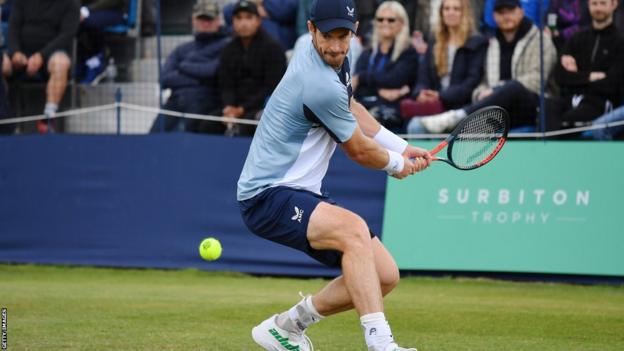 Andy Murray hitting a backhand shot