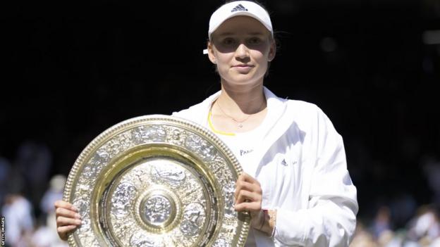 Elena Rybakina with the Wimbledon women's trophy in 2022