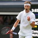 Carlos Alcaraz withstands errors to advance at Wimbledon