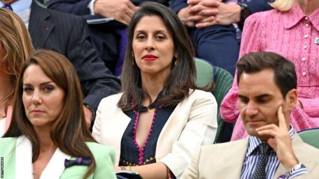 Nazanin Zaghari-Ratcliffe sits behind the Princess of Wales and Roger Federer during Andy Murray's first-round win at Wimbledon