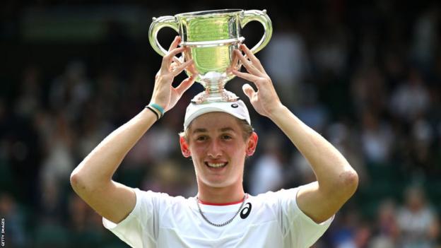 Henry Searle became Britain's first junior Wimbledon champion since Laura Robson won the girls' event in 2008