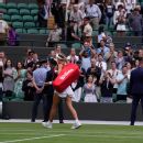 Wimbledon says it won't make decrees on handshake etiquette