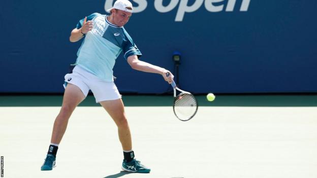 Dominic Stephan Stricker takes a shot during his US Open second-round match