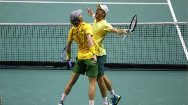 Max Purcell (left) and Matthew Ebden celebrate victory for Australia
