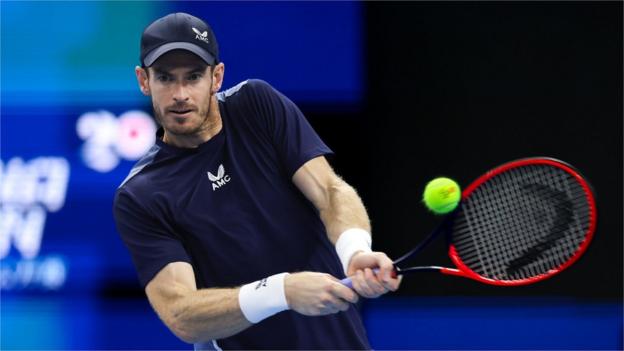 Andy Murray plays a backhand