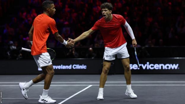 Felix Auger-Aliassime and Ben Shelton celebrate winning a doubles match in the 2023 Laver Cup