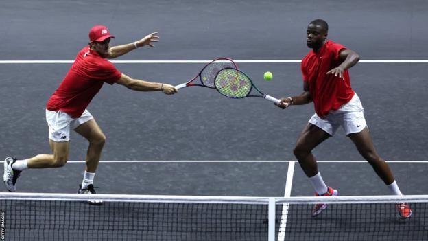 Team World's Tommy Paul and Frances Tiafoe in action