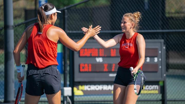 Cai and Mukhortova celebrate after a win