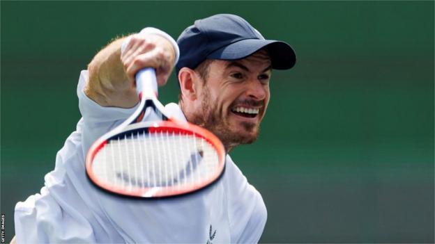 Andy Murray hits a serve in Shanghai