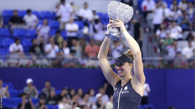 Beatriz Haddad Maia of Brazil poses with the trophy